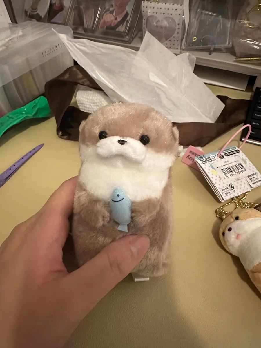 Surprise someone special with our Japanese Otter Plush hugging a fish! Soft, safe, and adorable. Perfect for gifting. 🎁 Shop now and bring joy!