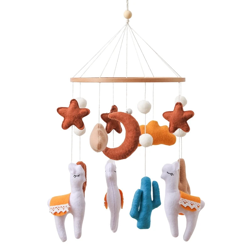 Children's mobile with starfish, moon, and llama shapes on a white background