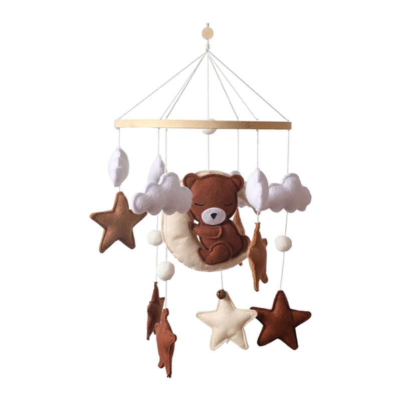Baby mobile with teddy bear and stars on a white background