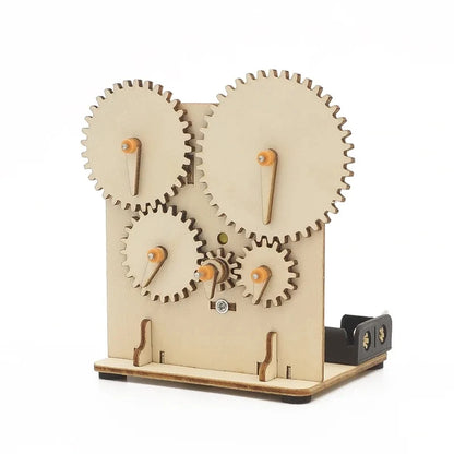 Assembled 3D wooden mechanical gear puzzle showing the interlocking gear mechanism and battery holder