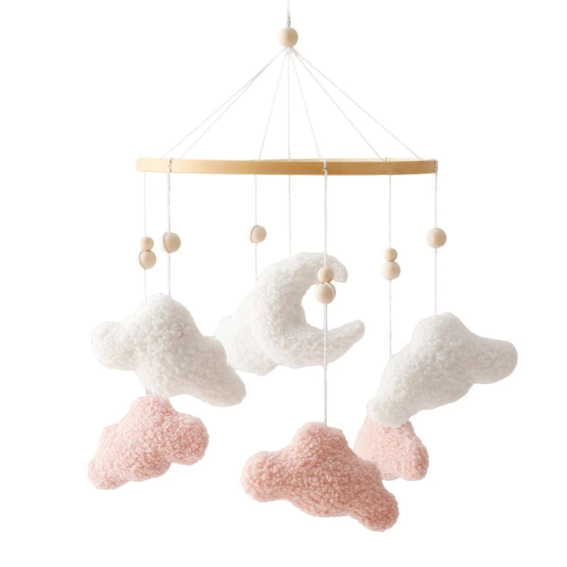 Decorative mobile with cloud shapes on a white background