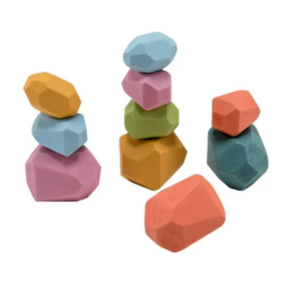 Colorful geometric wooden blocks on a white background
