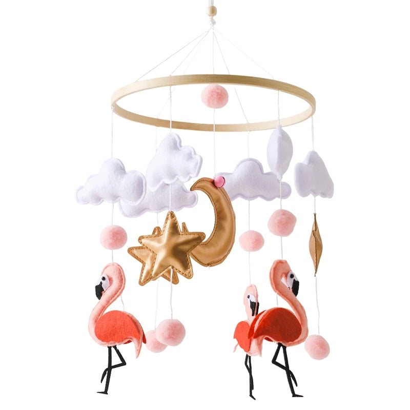 Children's mobile with flamingos, clouds, and stars on a white background
