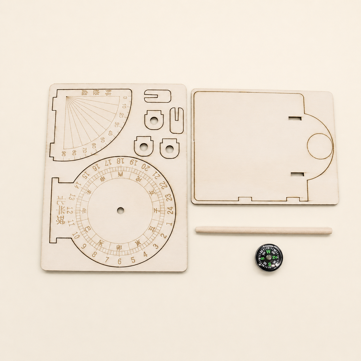 Unassembled wooden parts and compass included in the DIY sundial clock kit