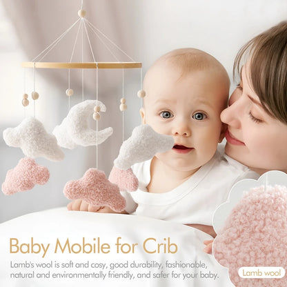 Baby mobile with clouds and stars hanging above a baby and a woman, with text about its benefits.