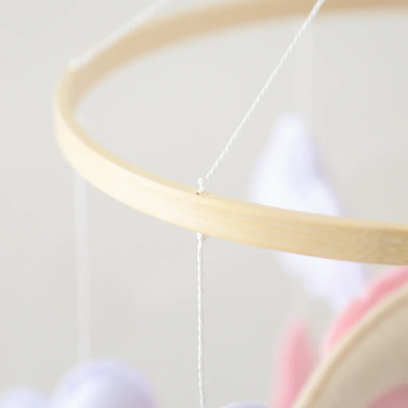 Close-up of a wooden embroidery hoop with a blurred background
