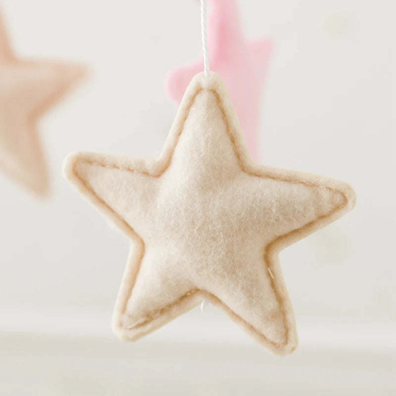 Star-shaped fabric ornament on a light background